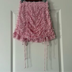 NWOT Dolls Kill Sugar Thrillz pink ruched bow mini skirt